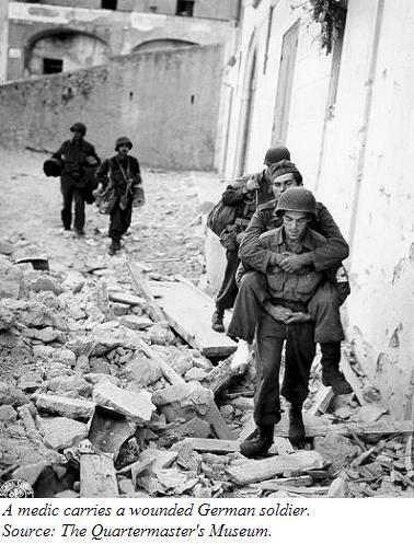 Medic carrying a wounded German soldier